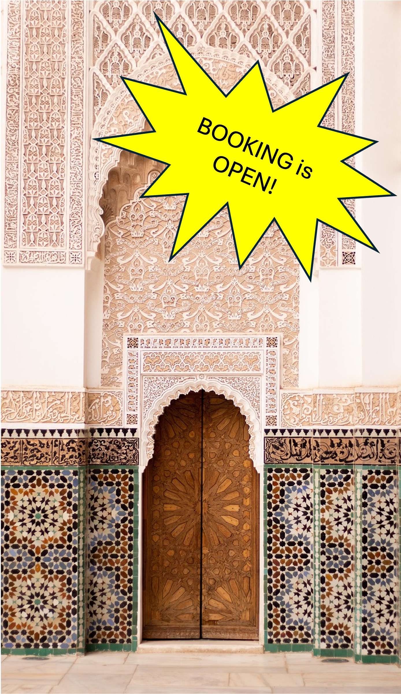Ancient door of Marrakech Mosque with typical colored decorations
